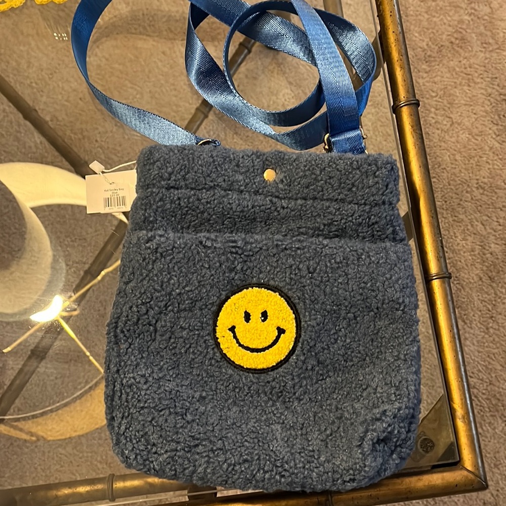 Cross body bag with smiley face